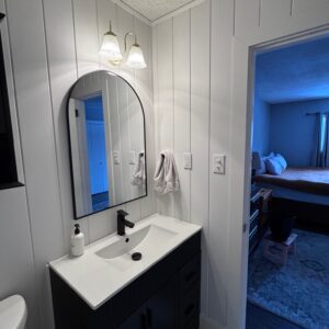 Bathroom vanity wall with V-groove panels