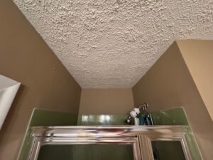 Before bathroom wall renovation in Collinsville CT condo
