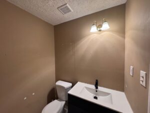 Before bathroom wall renovation in Collinsville CT condo